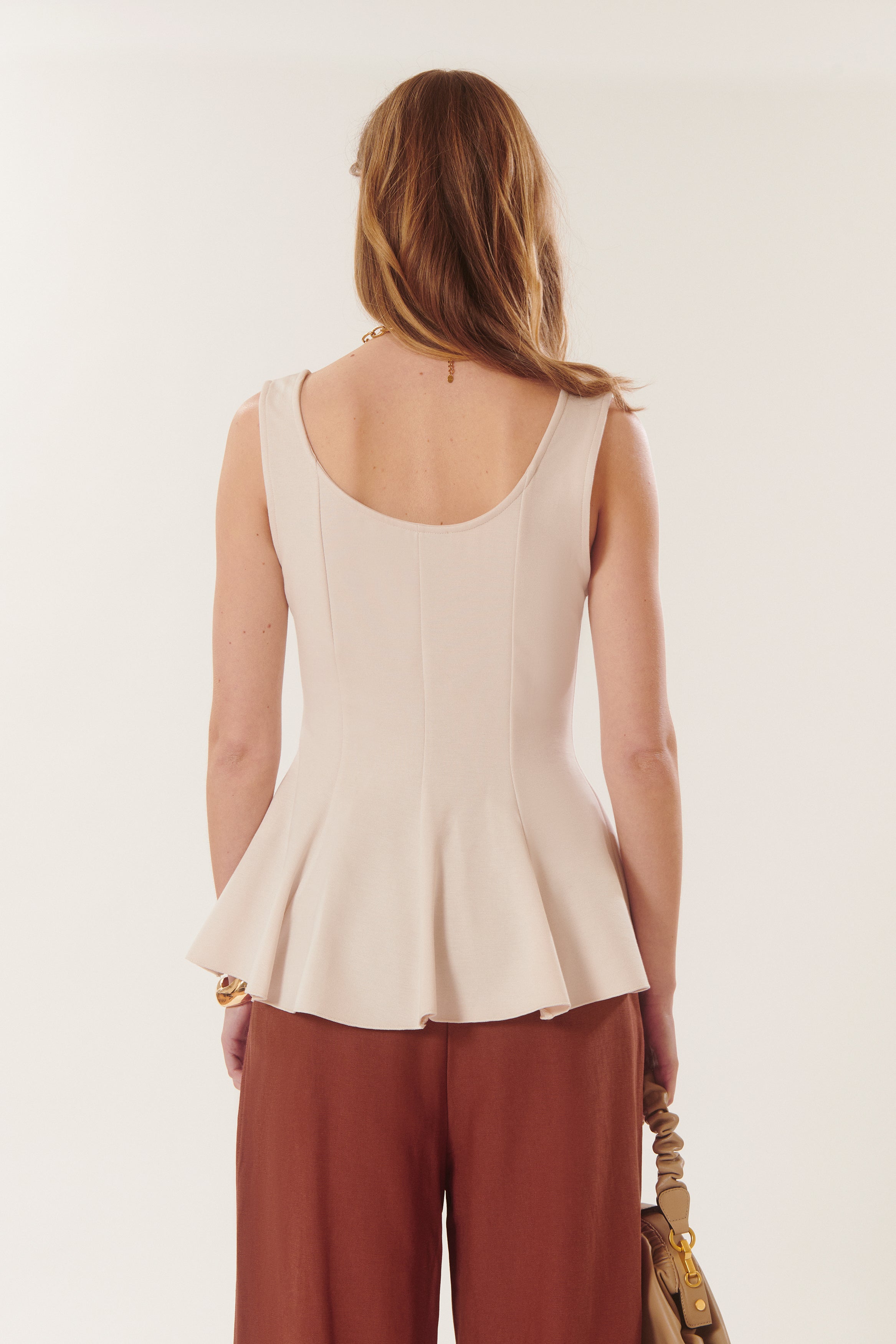 Todd | Peplum sleeveless top